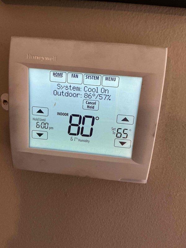 Responded to no cooling call on 8-year-old residential air conditioning system that stopped operating over the weekend. Upon arrival, diagnosed control board fault indicated by error code 22 displayed on the board's LED readout. Verified thermostat was calling for cooling with setpoint at 65° and indoor temperature reading 80°. Replaced defective control board, restored system to normal operation, and confirmed proper cooling cycle with outdoor unit running as commanded.
