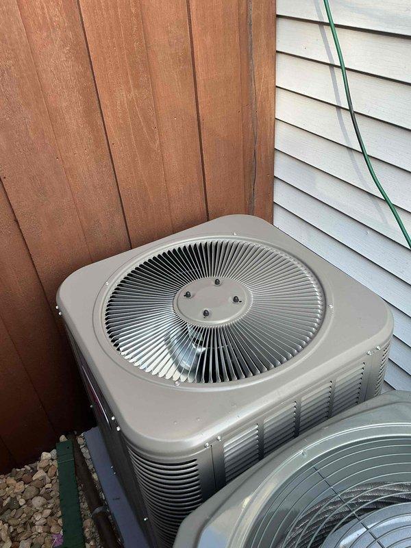Completed full HVAC system replacement including furnace and air conditioning equipment. Reclaimed existing refrigerant from old A/C system per EPA regulations, then disconnected and properly disposed of existing forced air furnace, A/C condenser unit, and evaporator coil. Installed new SL280UH070V36A forced air furnace (Cat #78W67) and connected to existing supply and return air ductwork with necessary sheet metal transitions fabricated on-site. Connected furnace to existing gas line, electrical circuit, and exhaust venting. Installed new ML13KC1-024-230 A/C condensing unit (Cat #25C64) on new pad with pea gravel base to ensure proper leveling and drainage. Mounted new evaporator coil compatible with new system. Connected both units to existing copper refrigerant line-set. Performed complete system evacuation to remove all moisture and air, then charged system with R454B refrigerant to manufacturer specifications. Conducted full start-up procedures, tested all safety controls, verifie