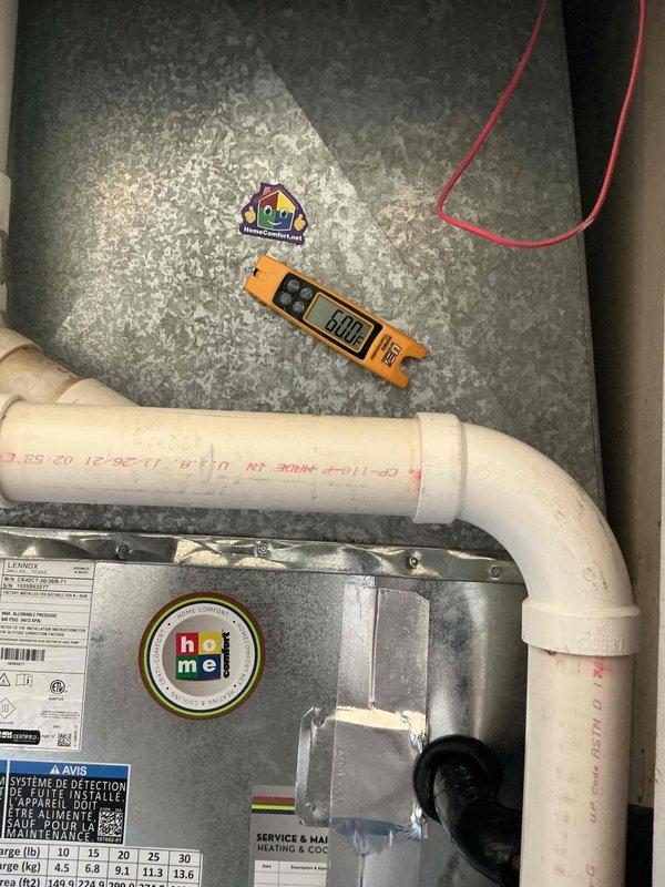 Replaced defective thermal expansion valve (TXV) on Lennox HVAC system under manufacturer warranty using part number 26Z70. Verified proper system temperatures and operation following installation, with supply air temperature measuring 60°F and refrigerant line temperature at 155°F, confirming appropriate system performance and successful completion of warranty repair.