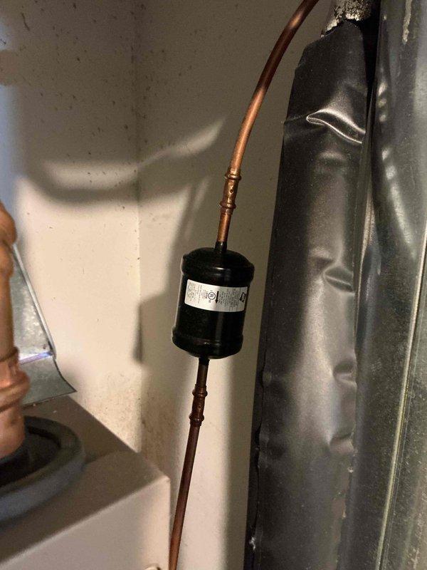 Completed installation of line dryer on refrigerant circuit that was omitted during original equipment installation. Brazed filter drier into suction line with proper connections, ensuring system protection from moisture and contaminants. Verified all joints for proper seal and system integrity upon completion.
