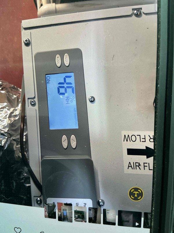 Completed warranty replacement of defective digital display panel on dehumidifier unit. Removed failed control panel, installed new digital screen assembly showing proper operation with clear display reading and functional control buttons, and retained original defective component for warranty claim processing.