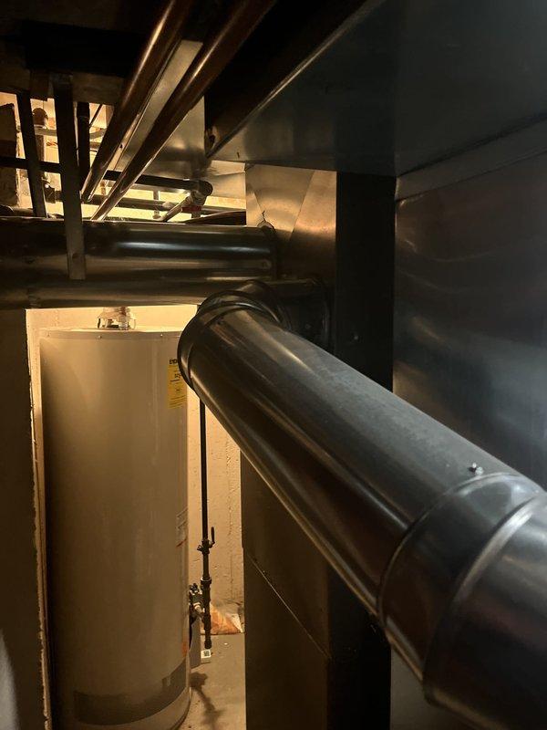 Responded to service call for 15-year-old Carrier air conditioner (Model: CNPVP3017ALAAAAA, Serial: 3014X25854) experiencing refrigerant line freezing due to suspected TXV valve failure. Conducted thorough system assessment and provided estimate for thermostatic expansion valve replacement to restore proper refrigerant flow and eliminate freeze-up condition.
