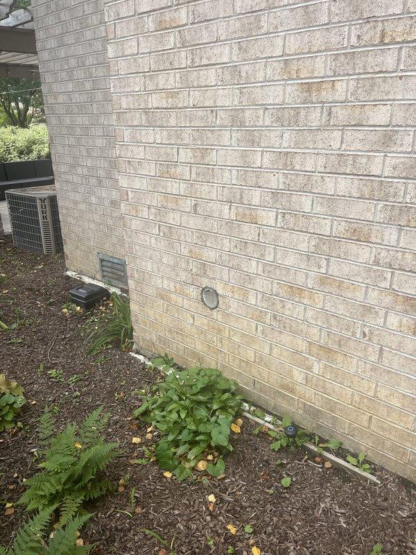 Completed comprehensive assessment of existing HVAC system located in residential basement, including aging furnace with vertical flue pipe and external AC condenser unit positioned at building exterior. Documented current equipment conditions, measured installation space requirements, photographed existing ductwork connections and utility room layout, and provided detailed replacement estimate for new air conditioning system and furnace due to equipment age and obsolescence.