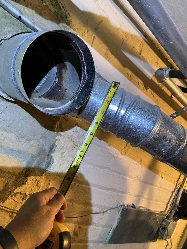 Completed comprehensive tune-up service on two HVAC systems including boiler and furnace. Performed standard maintenance procedures, collected combustion analysis data, and inspected ductwork measurements in basement and attic areas. Identified potential thermostat replacement need on boiler system and discussed previous roof vent estimate with property owner, addressing technical installation considerations related to existing chimney height and configuration.