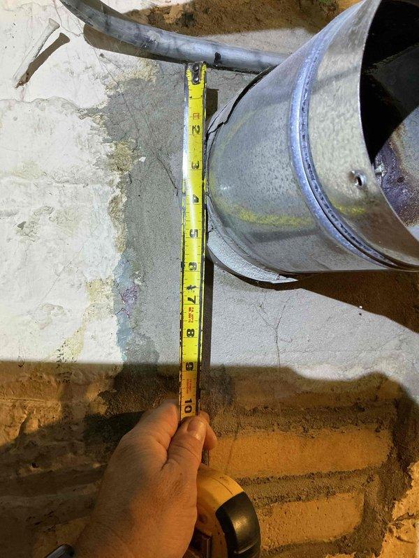 Completed comprehensive tune-up service on two HVAC systems including boiler and furnace. Performed standard maintenance procedures, collected combustion analysis data, and inspected ductwork measurements in basement and attic areas. Identified potential thermostat replacement need on boiler system and discussed previous roof vent estimate with property owner, addressing technical installation considerations related to existing chimney height and configuration.