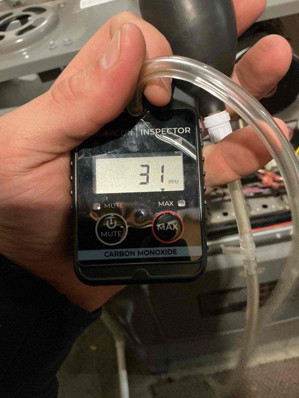 Completed spring preventative maintenance on commercial heating unit. Performed comprehensive system inspection per checklist, tested flame sensor for proper operation, and conducted combustion safety analysis measuring carbon monoxide levels at 31 PPM. Documented equipment specifications and filter information, photographed components for service records, and confirmed all safety parameters within acceptable range.