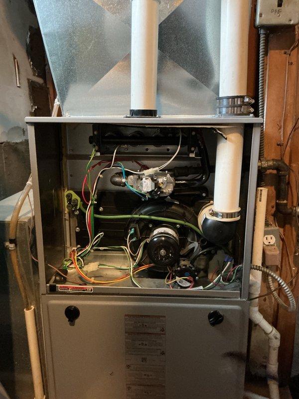 Replaced defective gas valve on residential furnace unit under warranty coverage. Accessed furnace interior, disconnected electrical connections and gas supply line from failed valve assembly, removed old component, and installed new gas valve with proper torque specifications. Reconnected gas piping with brass fittings, restored all electrical connections, and performed leak test on gas connections to verify system integrity. Cycled unit through complete heating operation to confirm proper ignition sequence and burner operation. All systems functioning normally upon completion.