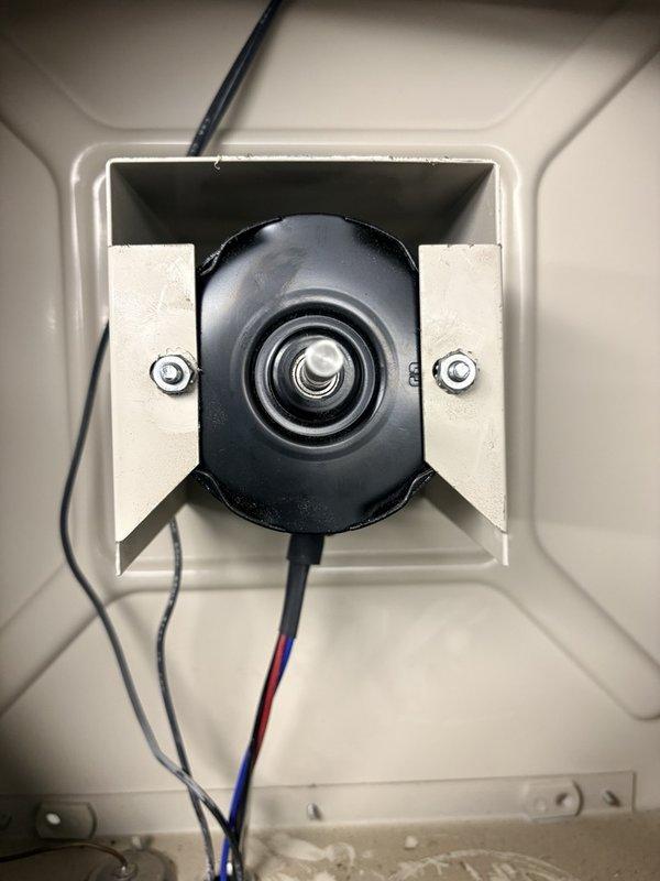 Responded to commercial facility for heater motor replacement in electrical room. Upon arrival, coordinated site access and proceeded to unit location. Removed and replaced defective motor assembly in ceiling-mounted QMARK unit heater with correct replacement motor. Verified proper electrical connections, tested unit operation, and confirmed heating functionality. Documented completed installation with photos showing proper motor mounting and wiring configuration.