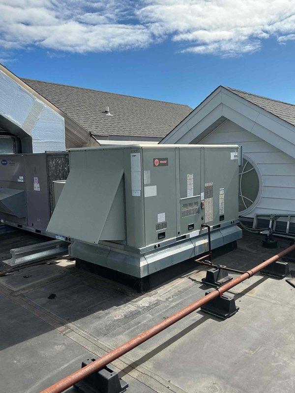 Performed evaporator coil cleaning service on rooftop units 3, 4, and 5. Accessed interior of each RTU, applied specialized coil cleaner to remove accumulated dust, debris, and discoloration from evaporator coil surfaces and fins. Documented pre-cleaning condition showing significant buildup on coil mesh and drain pan areas, then completed thorough cleaning to restore proper airflow and heat transfer efficiency across all three units.