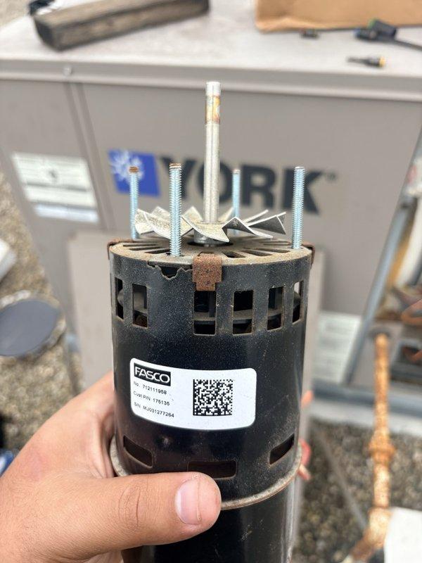 Replaced failed inducer motor on rooftop unit #1 with new FASCO model 7021-11458. Removed old motor assembly showing signs of wear, dust accumulation, and corrosion, then installed replacement unit and verified proper operation. Collected outstanding payment balance for completed repair work.