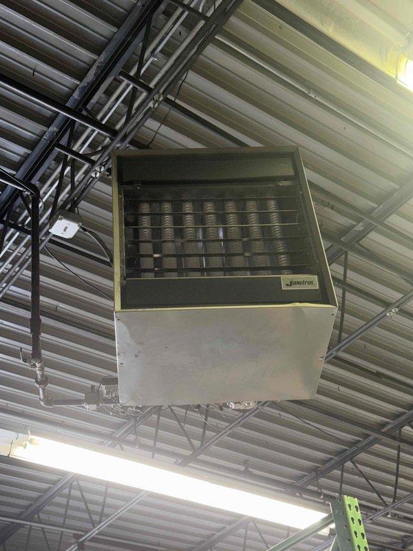 Completed commercial preventive maintenance agreement service on furnace and three ceiling-mounted unit heaters in industrial facility. Performed comprehensive cleaning and check procedures per contract protocol on all equipment, including inspection of gas valves, burner assemblies, and heat exchanger components. Documented equipment conditions with photographic evidence showing ceiling-mounted HVAC units with proper mounting and operational gas valve assemblies. Filter replacement information collected for proper sizing and quantity requirements to be billed separately per agreement terms.