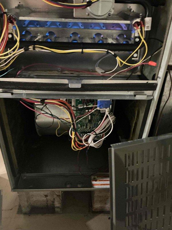 Completed comprehensive clean and check maintenance service on first floor furnace and humidifier system per comfort plan agreement. Performed thorough inspection of all furnace components including burner assembly, heat exchanger, ignition system, and electronic control board. Verified proper operation of blue flame burners and combustion chamber. Inspected all electrical connections and wiring harnesses for secure terminations and proper condition. Replaced standard air filter with new pleated media filter to ensure optimal airflow and system efficiency. Checked condensate drainage lines and PVC piping for proper function and clearance. All system components found operating within normal parameters with no deficiencies noted at time of service.