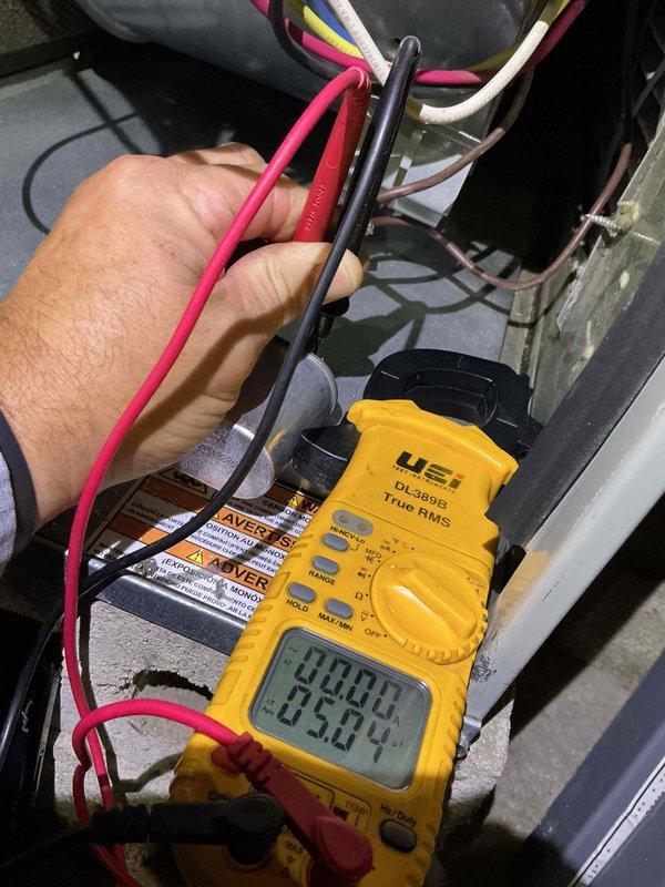 Completed annual tune-up on 13-year-old furnace located in basement. Performed comprehensive inspection and maintenance including removal and cleaning of burner assembly, verified proper ignition sequence, and tested all electrical components with multimeter to ensure proper voltage and amperage readings. Replaced humidifier filter in separate housing due to calcium buildup and verified humidifier operation. Inspected customer-maintained furnace filter and confirmed adequate condition. Checked and adjusted gas pressure, verified heat exchanger integrity, tested safety controls including limit switches and flame sensor, and confirmed proper blower motor operation and airflow. All components tested within manufacturer specifications with no issues identified. System operating efficiently and safely.