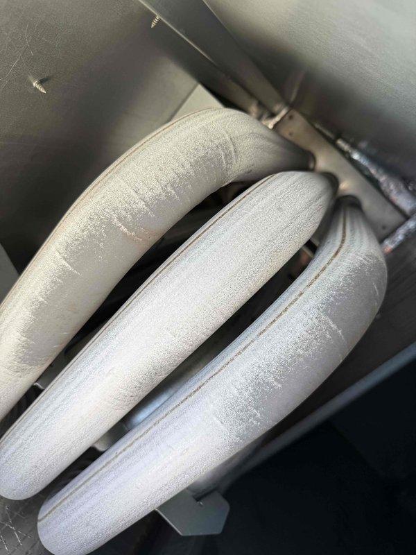 Completed fall preventative maintenance on commercial HVAC unit per contract requirements. Discovered significant frost and ice buildup on refrigerant lines indicating possible low refrigerant charge or restricted airflow issue. Documented equipment information, verified filter specifications, and captured temperature readings showing 17.5°F at coil, confirming abnormal operating conditions requiring follow-up repair.