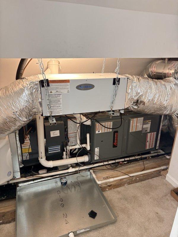 Completed WiFi display replacement on HVAC system and installed dual return air piping configuration per mechanical room sealing requirements. Both return lines were positioned 6 feet apart to ensure proper system operation once the mechanical room is enclosed. The horizontal air handler installation includes an Aprilaire unit with proper drainage configuration, flexible ductwork connections, and all components mounted and secured according to manufacturer specifications. All work completed in single visit as requested.