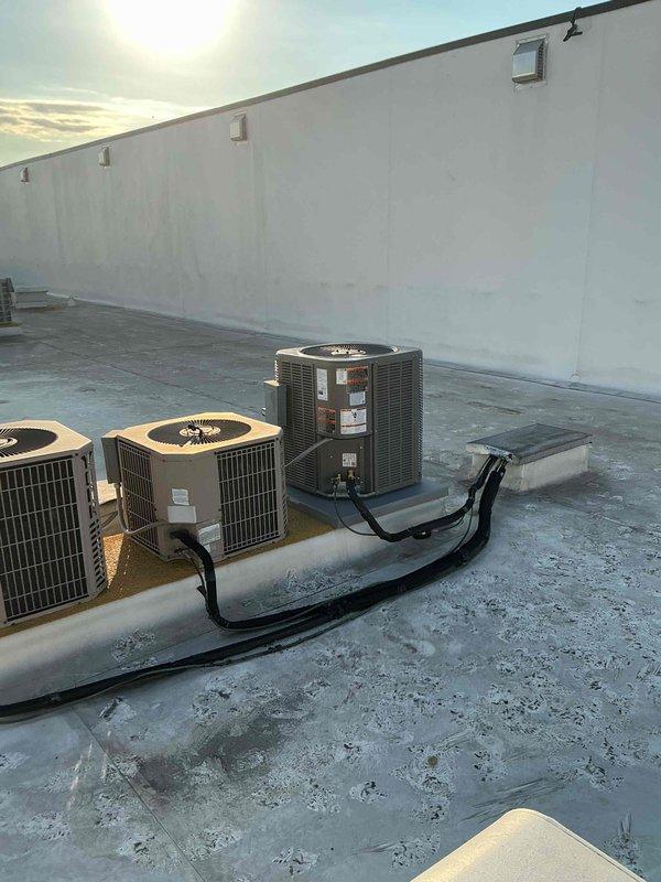 Completed full HVAC system replacement including removal and disposal of existing air handler with hydronic coil from mechanical closet and existing A/C condenser from rooftop per EPA guidelines. Installed new ADP 1.5-2.0 ton air handler with hydronic coil in mechanical closet, connecting to existing supply air ductwork, return air ductwork, and electrical service. Fabricated and installed necessary sheet metal transitions to ensure proper air handler installation and ductwork integration.

Installed new Lennox 13 SEER2 ML13KC1-024-230 2.0 ton air conditioning condensing unit on rooftop in same location as previous unit. Flushed existing copper lineset to remove contaminants and connected new condensing unit and evaporator coil to existing lineset. Performed system evacuation using vacuum pump to remove all moisture and air from refrigerant lines. Charged system with R454b refrigerant to manufacturer specifications.

Installed 3/4" zone valve for hydronic system integration, surge prot
