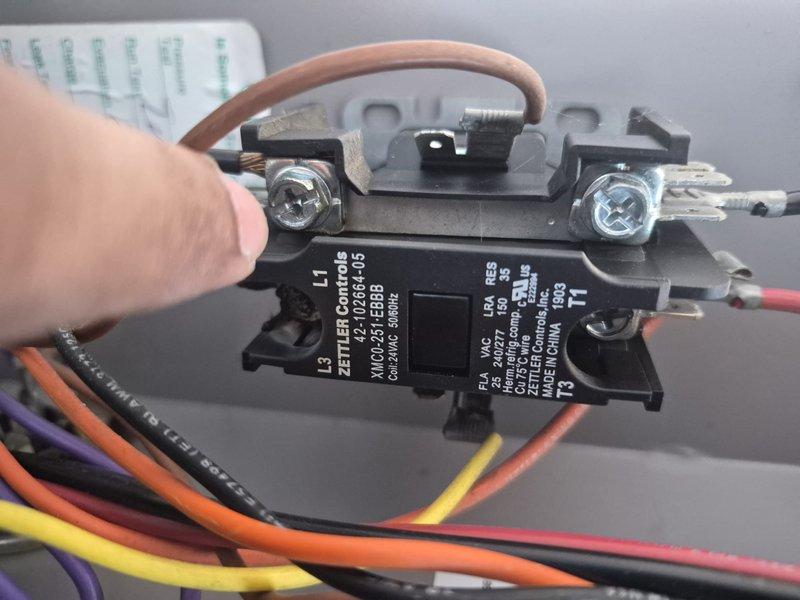 Responded to no cooling complaint with indoor temperature at 77 degrees. Diagnosed failed contactor preventing compressor operation. Replaced defective contactor with new unit, restored power to outdoor unit, and verified proper system operation. Documented equipment information including Bradford White water heater model RG140T6N. System now cooling properly and maintaining setpoint temperature.