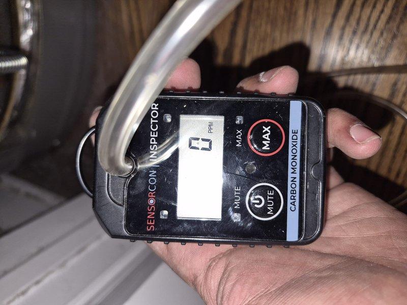 Performed Comfort Plan clean and check on the furnace and water heater, removing and inspecting the gas burner assembly and cleaning accumulated dust and deposits from the burner head to restore proper combustion. Verified safe operation with a carbon monoxide analyzer, which read 0 PPM, and confirmed the system operating normally at completion.
