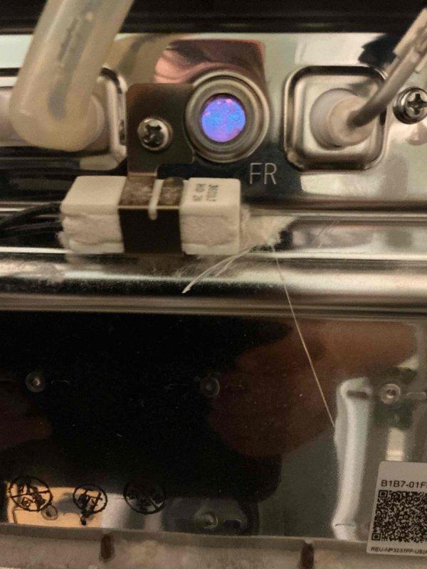 Diagnosed a tankless water heater displaying Error Code 12 (flame failure/no flame detection), a recurring fault. Inspected the burner assembly, flame rod, and flame sensor circuit, serviced the ignition and flame-sensing components, and verified a stable flame signal. Confirmed proper operation with the unit firing and delivering hot water at the set temperature of 135°F.