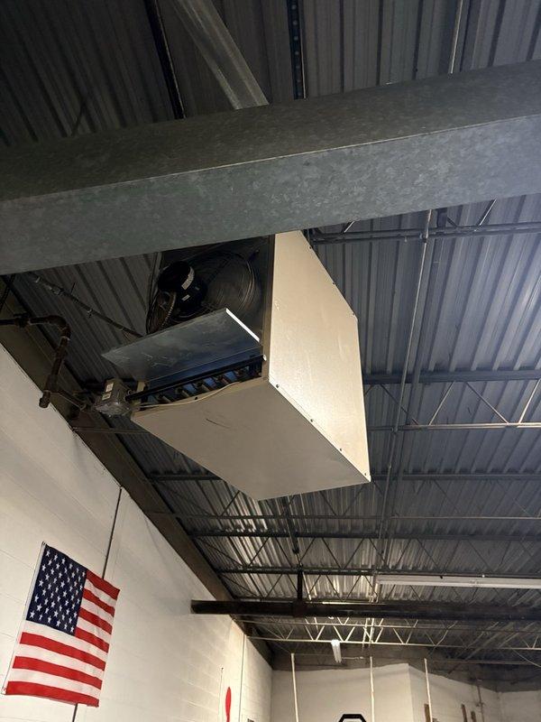 Performed fall preventive maintenance on a suspended gas-fired unit heater, completing the maintenance checklist and inspecting the fan assembly, burner tubes, heat exchanger surface, and gas piping connections. Documented updated equipment and filter information and flagged changes needed to update the filter list, with no frost, rust, or conspicuous damage observed on the unit.