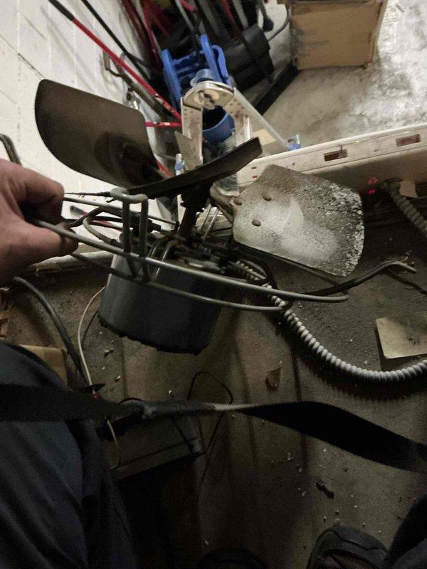 Replaced the failed blower motor on the suspended unit heater (HH#32). Removed the old motor and damaged, corroded fan blades, installed the new motor assembly, and reconnected the wiring and conduit. Cleaned accumulated dust and debris from the fan housing and verified proper unit operation.