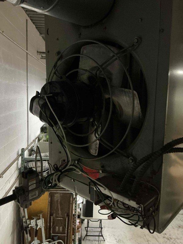 Replaced the failed blower motor on the suspended unit heater (HH#32). Removed the old motor and damaged, corroded fan blades, installed the new motor assembly, and reconnected the wiring and conduit. Cleaned accumulated dust and debris from the fan housing and verified proper unit operation.