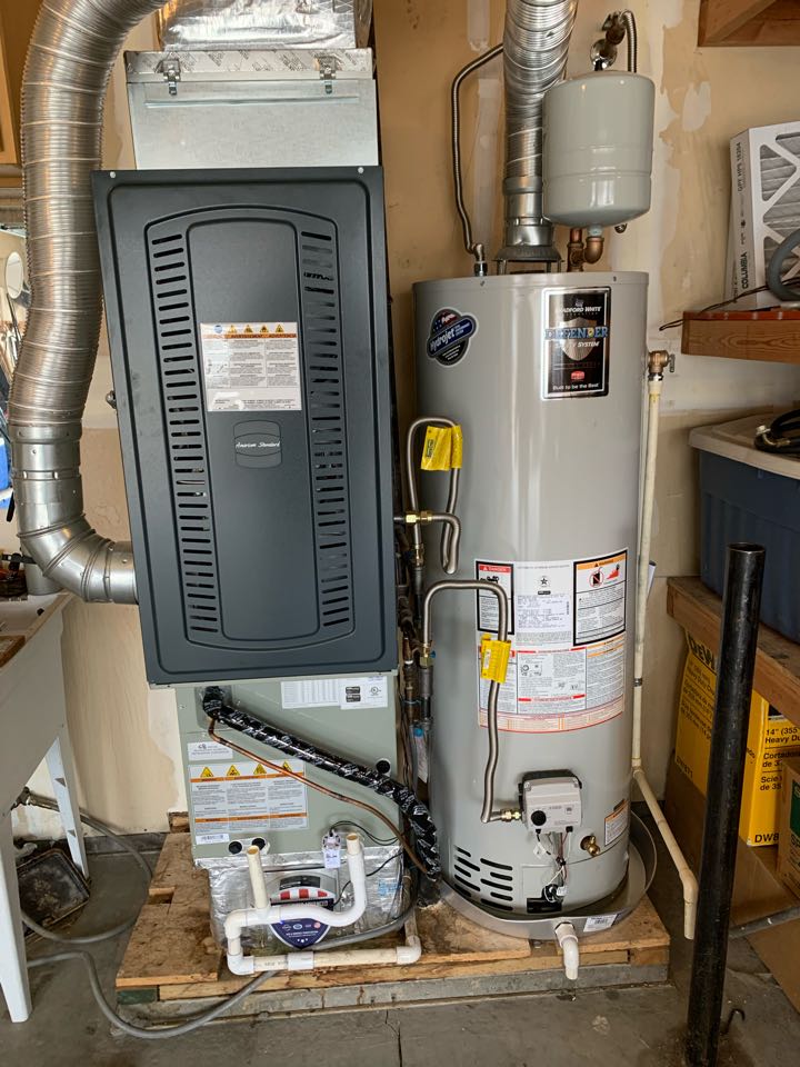 Nampa, ID - Full system, furnace, air conditioner coil install. Air Scrubber install, water heater install. Bradford White Water Heater, American Standard Gas furnace American Standard Air conditioner. Full system and water heater retrofit install. 