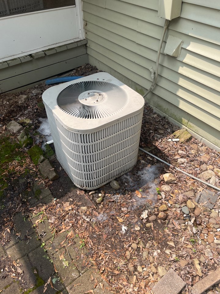 Perform maintenance on Goodman air conditioner