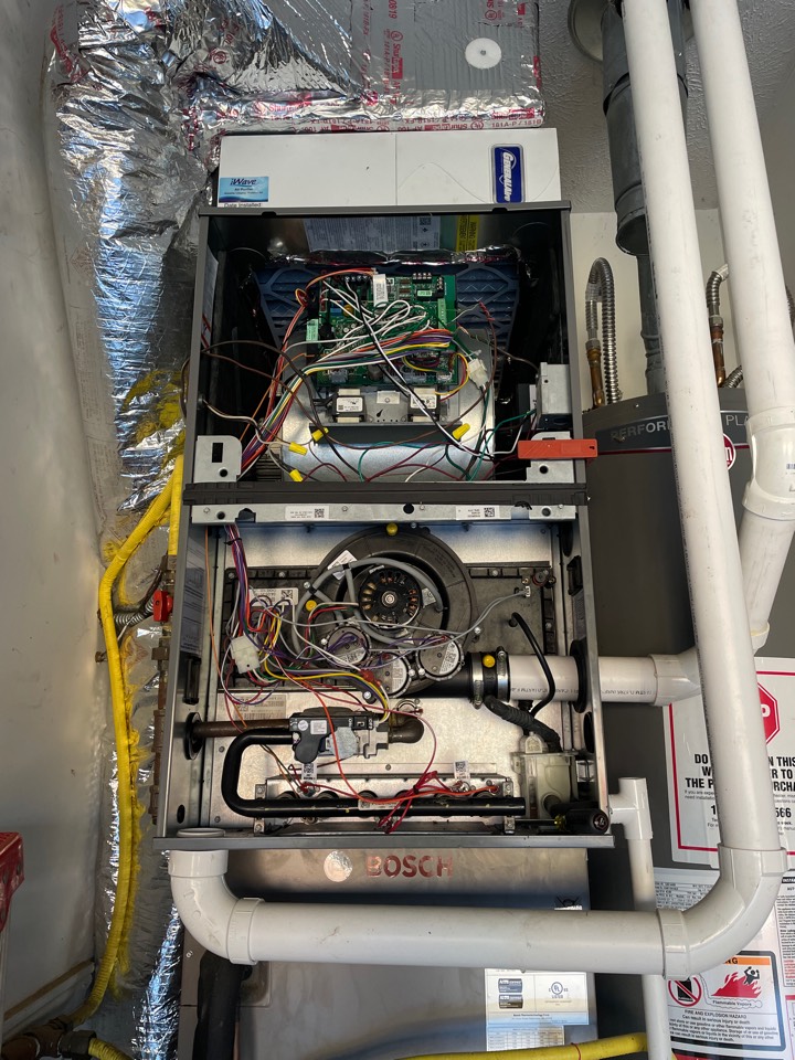 Perform heating maintenance on a Rheem furnace. 