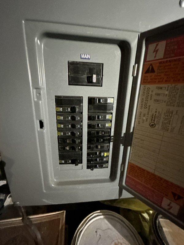 Performed initial assessment for customer's requested electrical upgrades. Inspected main circuit breaker panel and junction box with exposed wiring, noting aged components and disorganized wiring configuration. Documented existing electrical infrastructure with photos for comprehensive quote preparation.