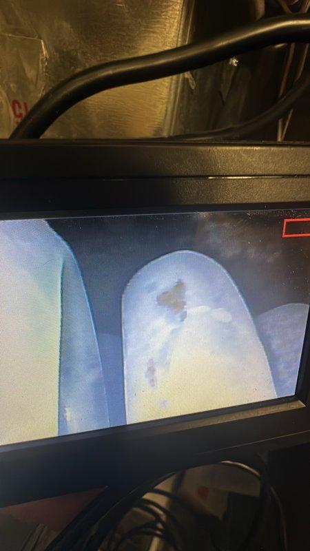 Performed requested routine maintenance on client's older furnace, including thorough cleaning of burners. Conducted comprehensive inspection using borescope camera to examine internal components and verify proper cleaning of combustion chamber and heat exchanger surfaces.