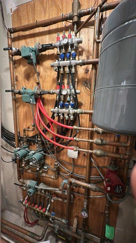 Responded to customer report of possible pressure valve leak on 2023-installed furnace. Upon inspection of the residential hydronic heating system, examined copper piping network, manifolds with PEX connections, and zone control valves. No active leaks were found in the plumbing assembly or pressure relief valve. System pressure tested and verified to be operating within normal parameters.