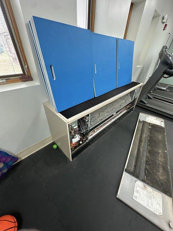 Conducted on-site assessment for duct cleaning service requested in single classroom area. Inspection revealed extensive HVAC system with professionally installed galvanized steel ductwork, including insulated sections and associated condensate drainage. Additional examination of air handling equipment showed accessible internal components requiring maintenance attention, indicating potential for more comprehensive service than initially requested.