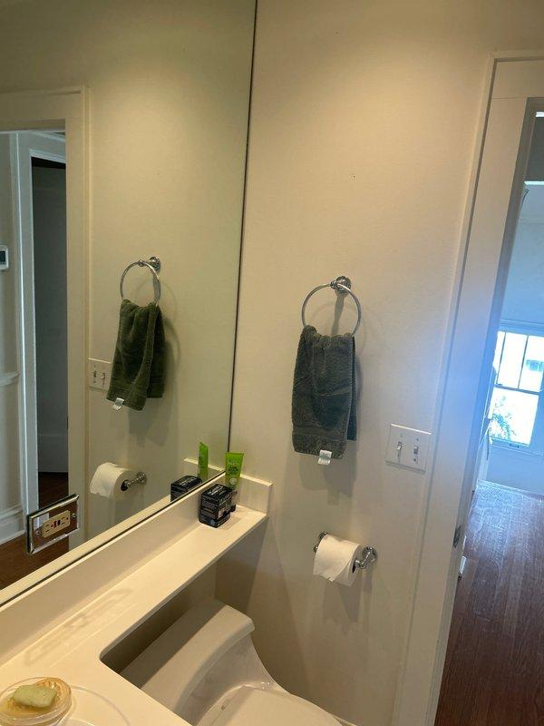 Conducted inspection of bathroom electrical fixtures to verify previous quote details. Documented existing ventilation fan, recessed lighting, and standard electrical outlet placement to ensure accurate assessment. Completed site evaluation for client to receive updated service proposal.