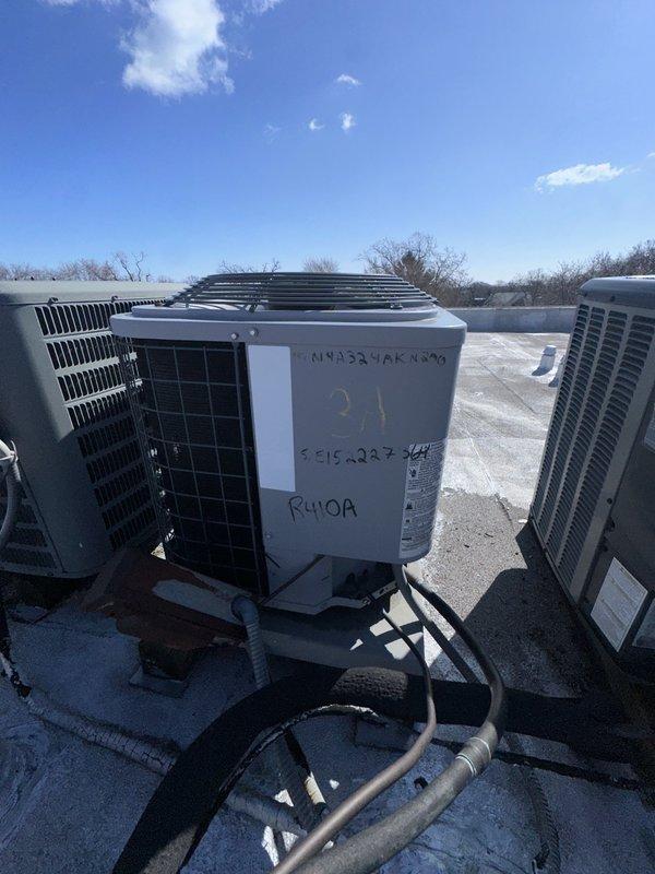 Completed free system inspection promotion, examining electrical panel and rooftop HVAC units. Discovered significant wall damage exposing PVC plumbing, with signs of water damage requiring repair. Documented existing HVAC equipment on commercial rooftop and provided quote for new outlet installation as requested.