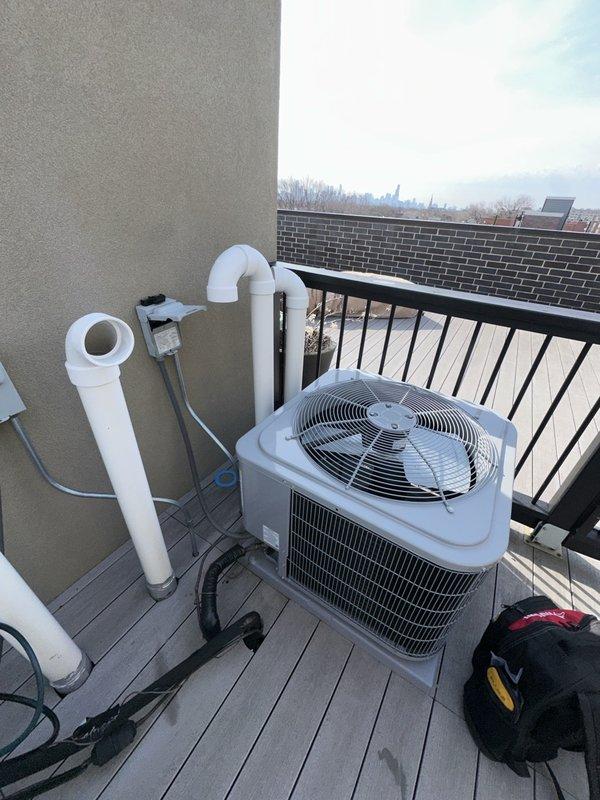 Completed preventive maintenance service on residential HVAC system. Performed thorough cleaning and inspection of outdoor AC condenser unit located on balcony, checked refrigerant lines and electrical connections. Inspected indoor equipment including furnace and Aprilaire humidifier system, verified proper operation of all components, cleared condensate drain lines, and confirmed system is operating within manufacturer specifications.
