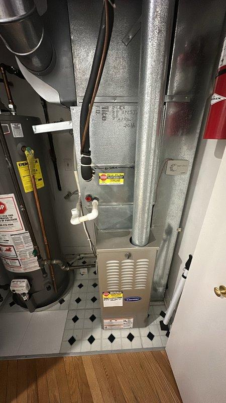 Completed comprehensive A/C preventative maintenance on residential HVAC system located in utility closet. Performed full system inspection of air handler unit, verified proper airflow through ductwork, checked electrical connections and wiring, inspected condensate drain line for proper operation, and confirmed all safety labels and equipment were in compliance. All components operating within normal parameters with no issues identified during this scheduled maintenance visit.