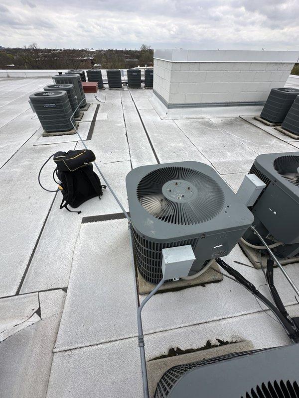 Completed bi-annual preventative maintenance on residential HVAC system. Performed comprehensive inspection of air handler unit located in interior mechanical room, verified proper operation of all components, checked electrical connections, and inspected ductwork sealing. Proceeded to rooftop to service multiple condensing units, cleaned condenser coils, checked refrigerant levels, verified proper airflow across all units, and tested system operation under load to ensure optimal performance for continued reliable cooling.