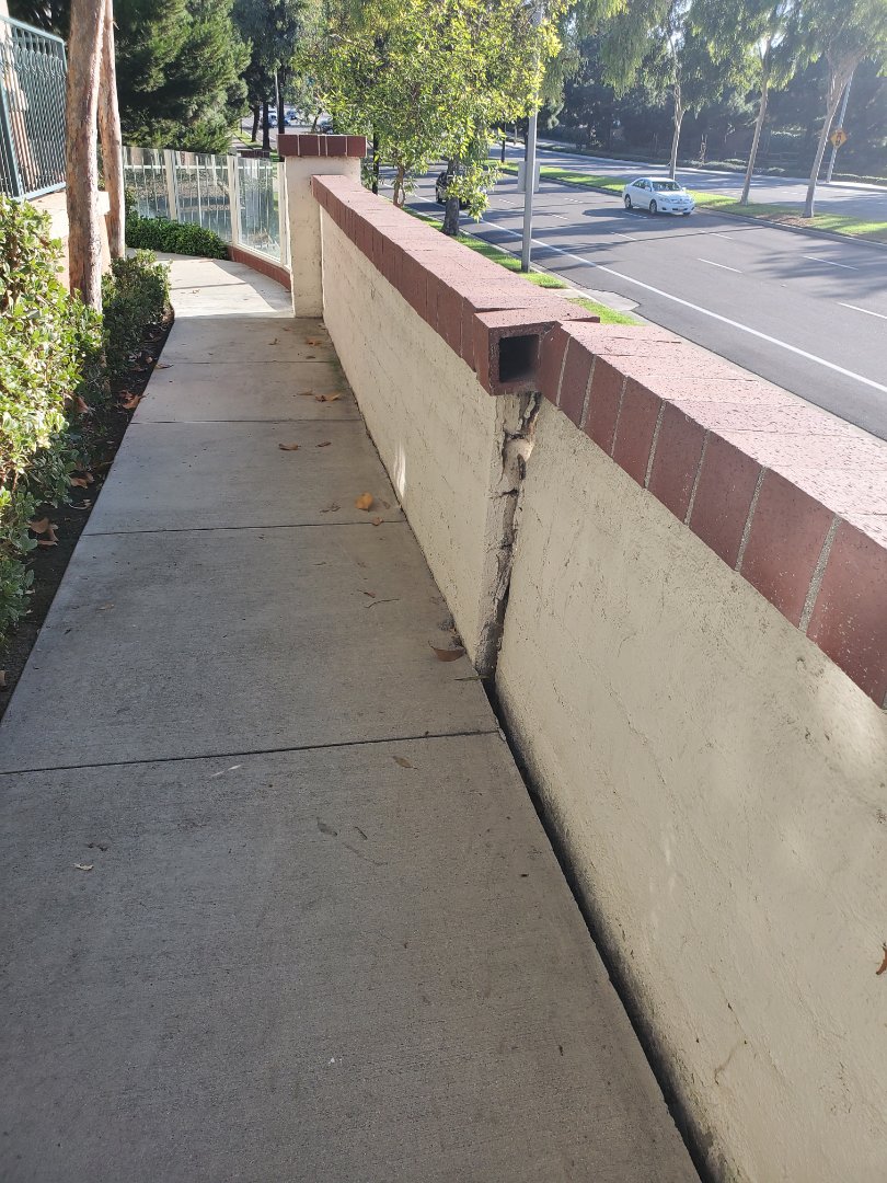 Inspecting a cmu wall that has rotated. 