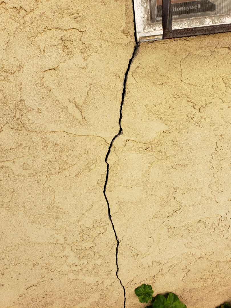 House settlement by almost-3.0" with settlement exterior cracks. 