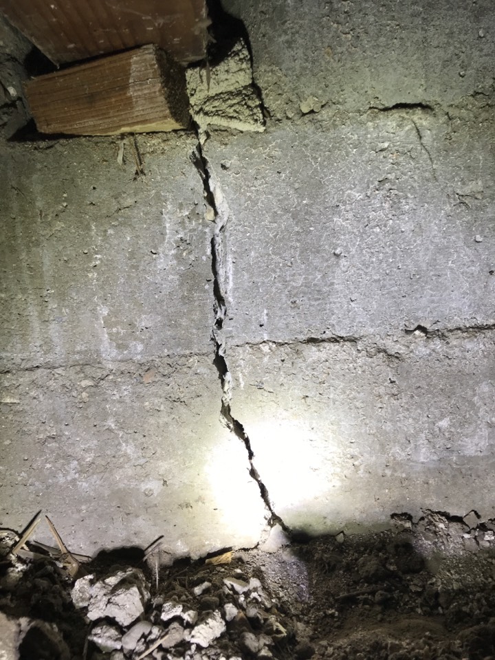 Looking to see why cracks in a foundation are getting bigger when it rains. 