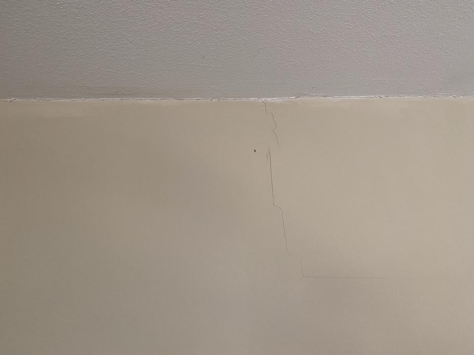 Ceiling ripping due to 3” of settlement.