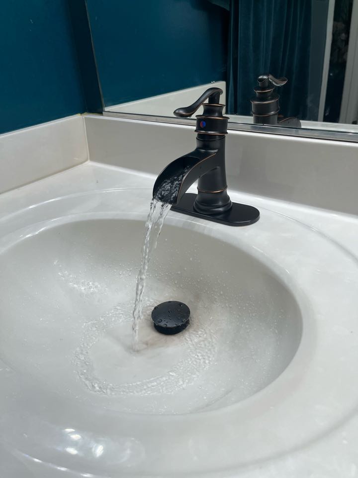 Installing new bathroom faucets and shut off valves 