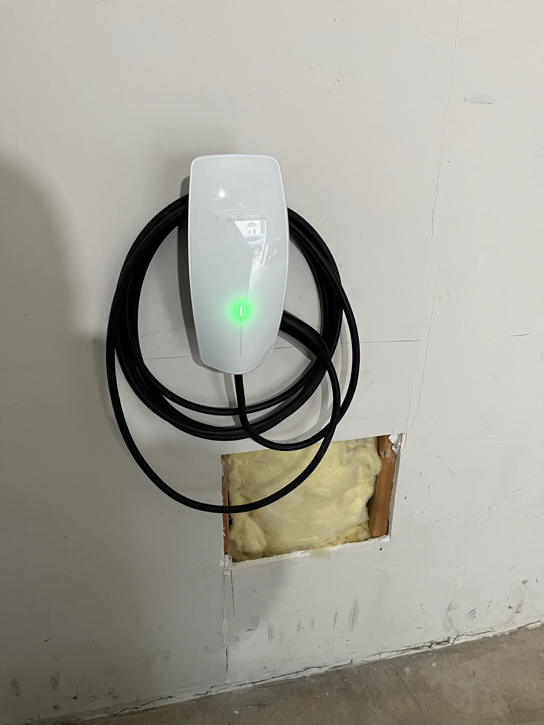 Installed new 50 amp Tesla wall charger for customer with whole home surge protection 