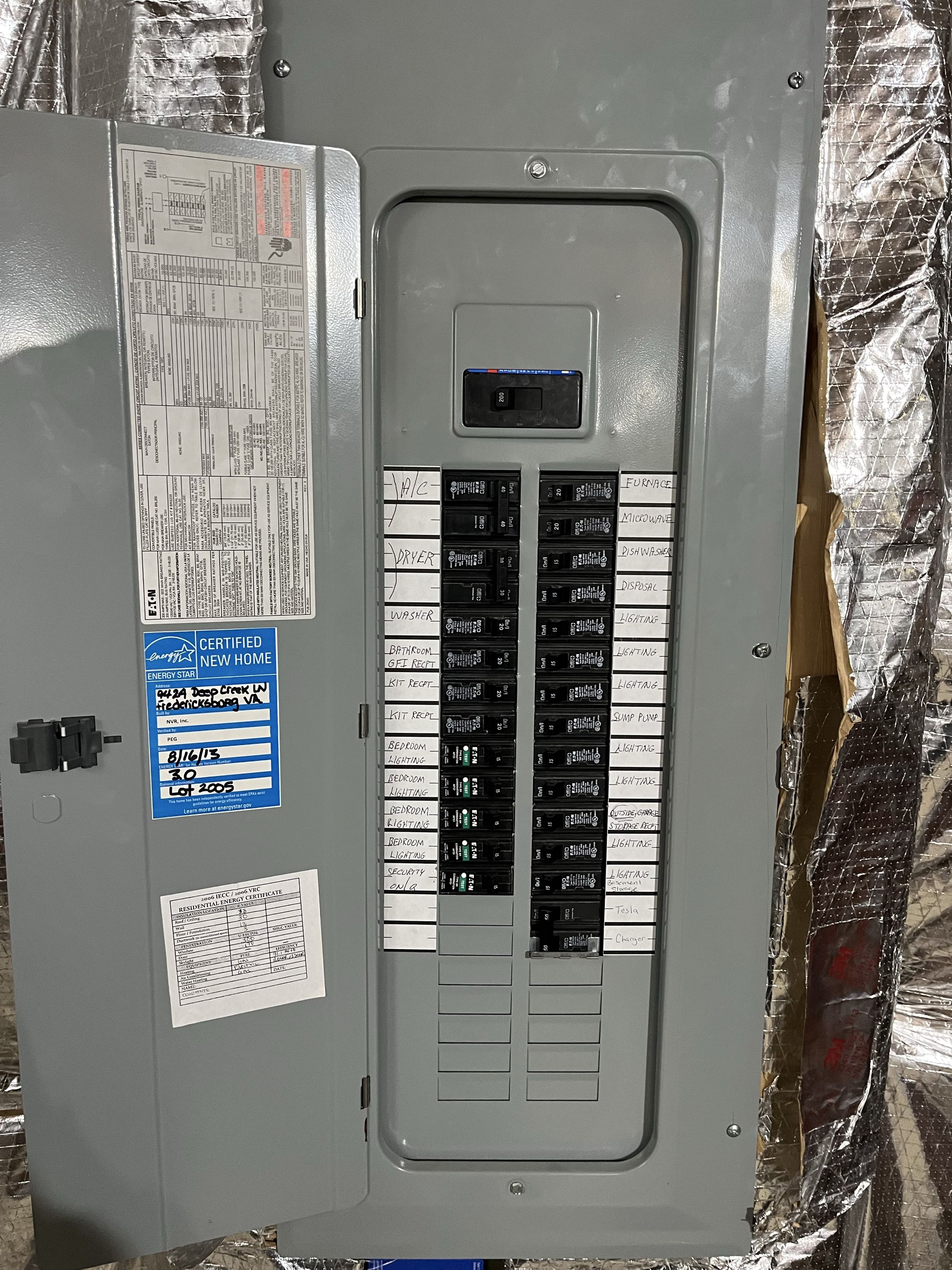 Installed new 50 amp Tesla wall charger for customer with whole home surge protection 