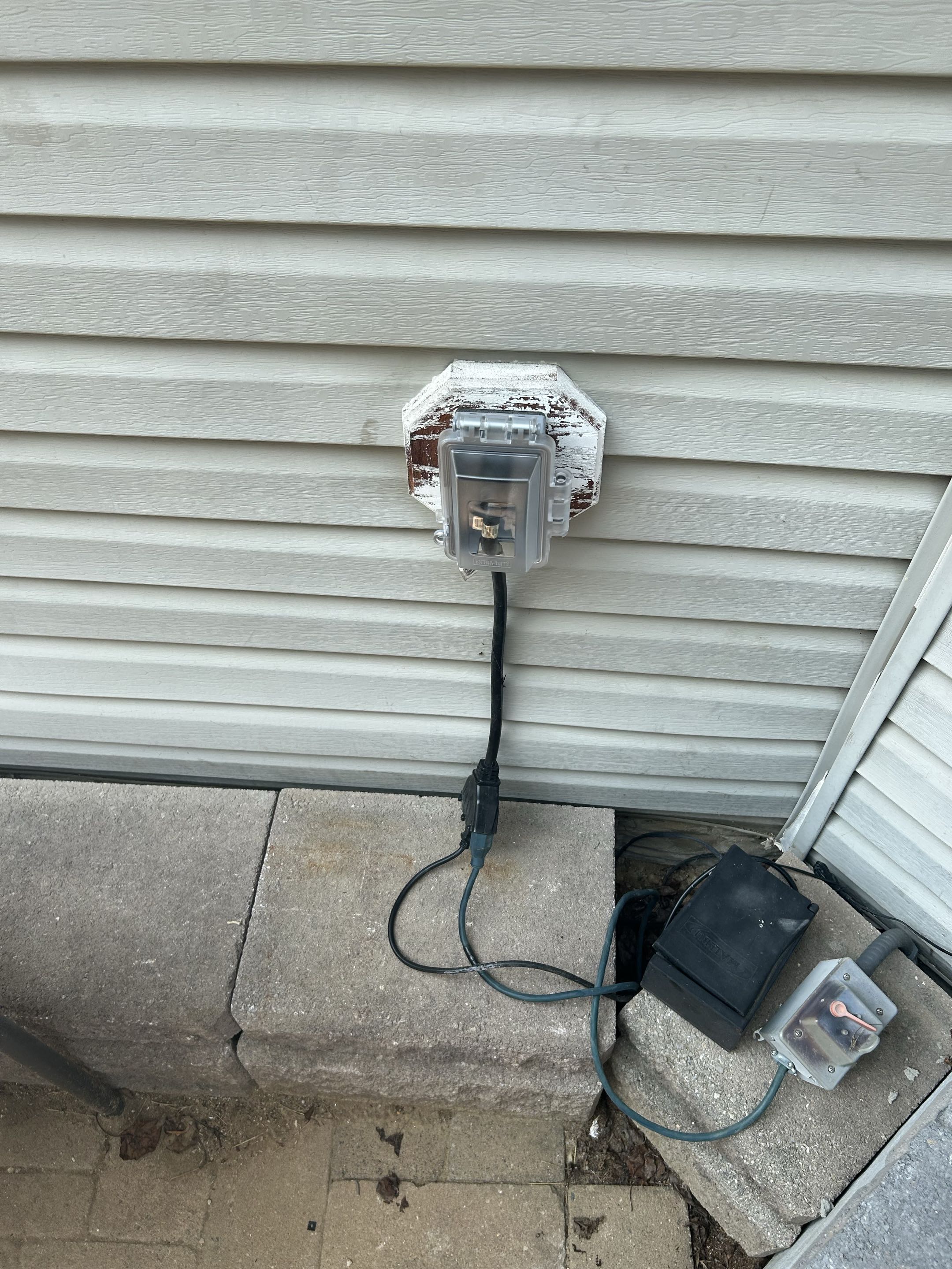 Replaced old GFCI outlet in garage as well as installed new bubble cover on back porch outlet