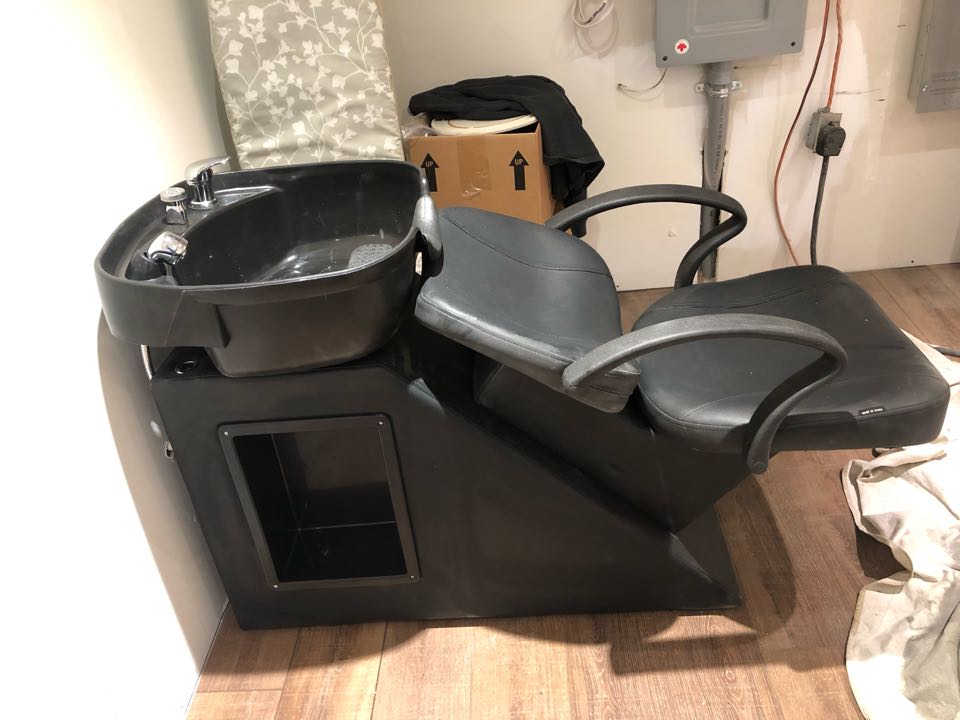 Installation of shampoo chair 