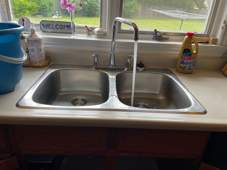 Snake kitchen sink drain line and power flush 