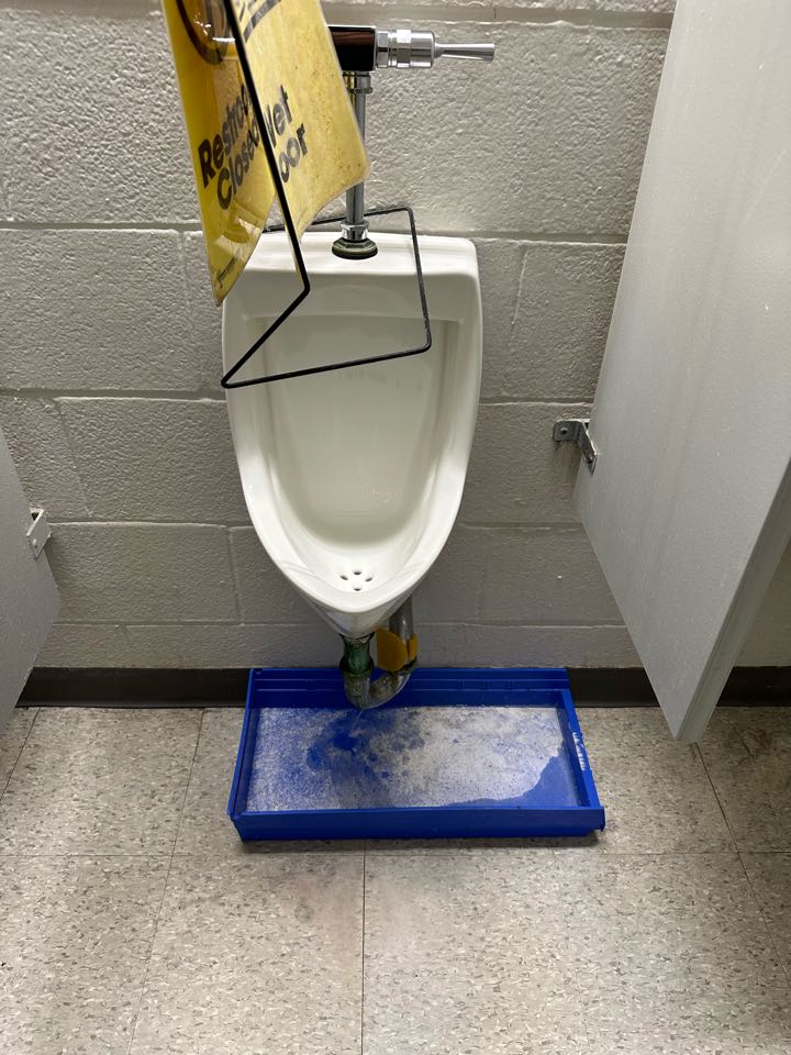 Fixing urinal drain issues 