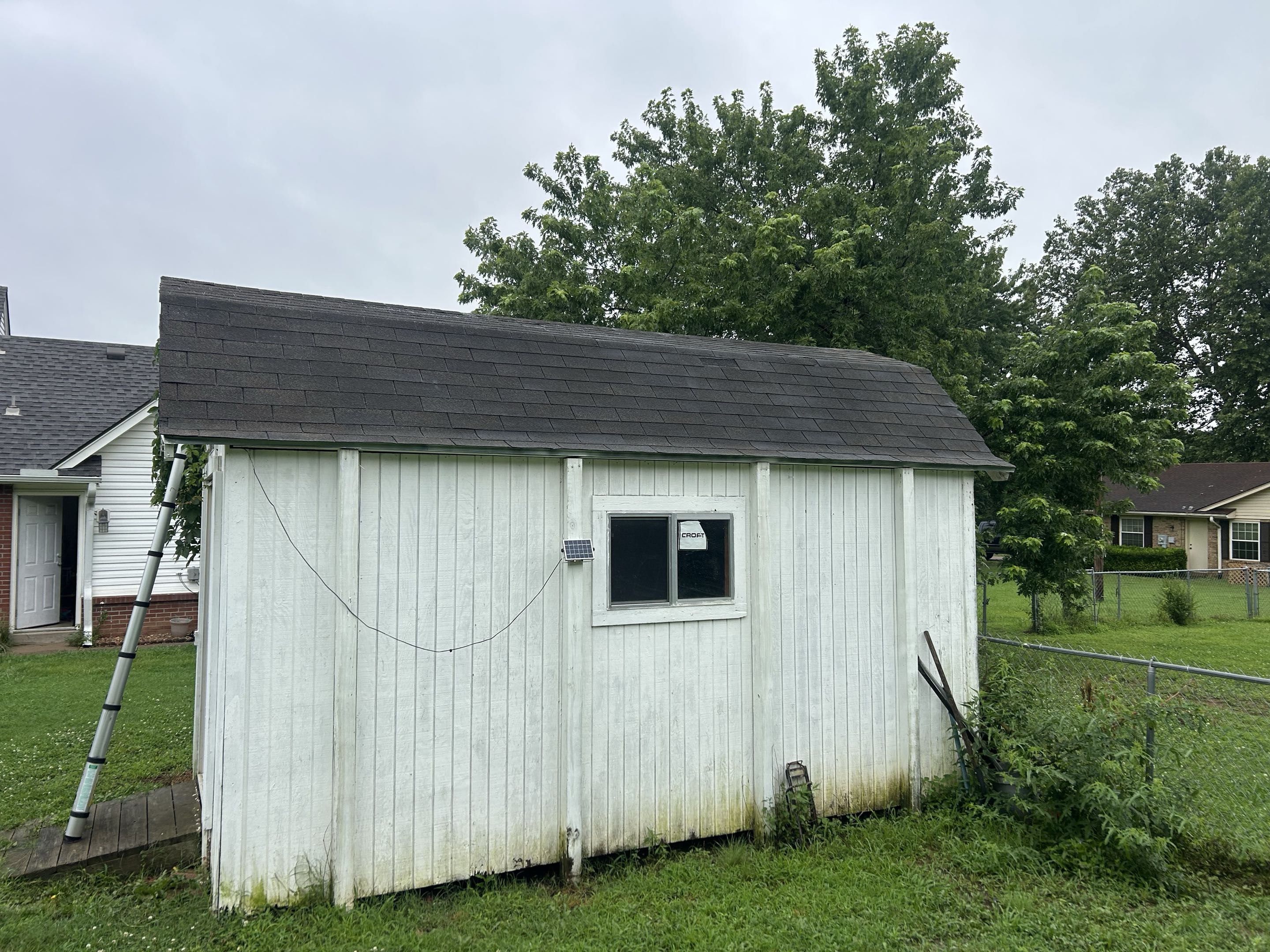 Free estimate for a shed roof replacement and a 4” furnace pipe flashing reset.